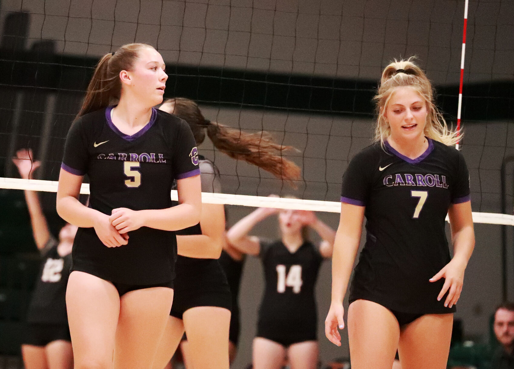 Carroll's Elizabeth Heuiser (5) and Hannah Schweikert (7)